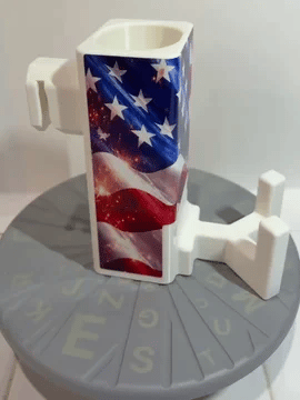 A rotating white Paddle Saver™ with an attached Stars, Stripes N' Slams skin. The skin has a patriotic theme with just an American flag.