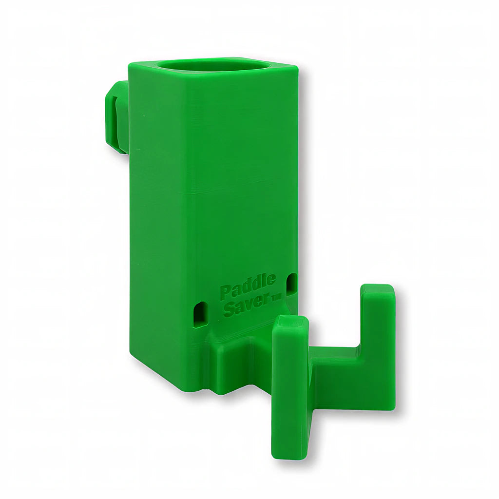 Paddle Saver™ in green. Patented fence mounted pickleball paddle holder.